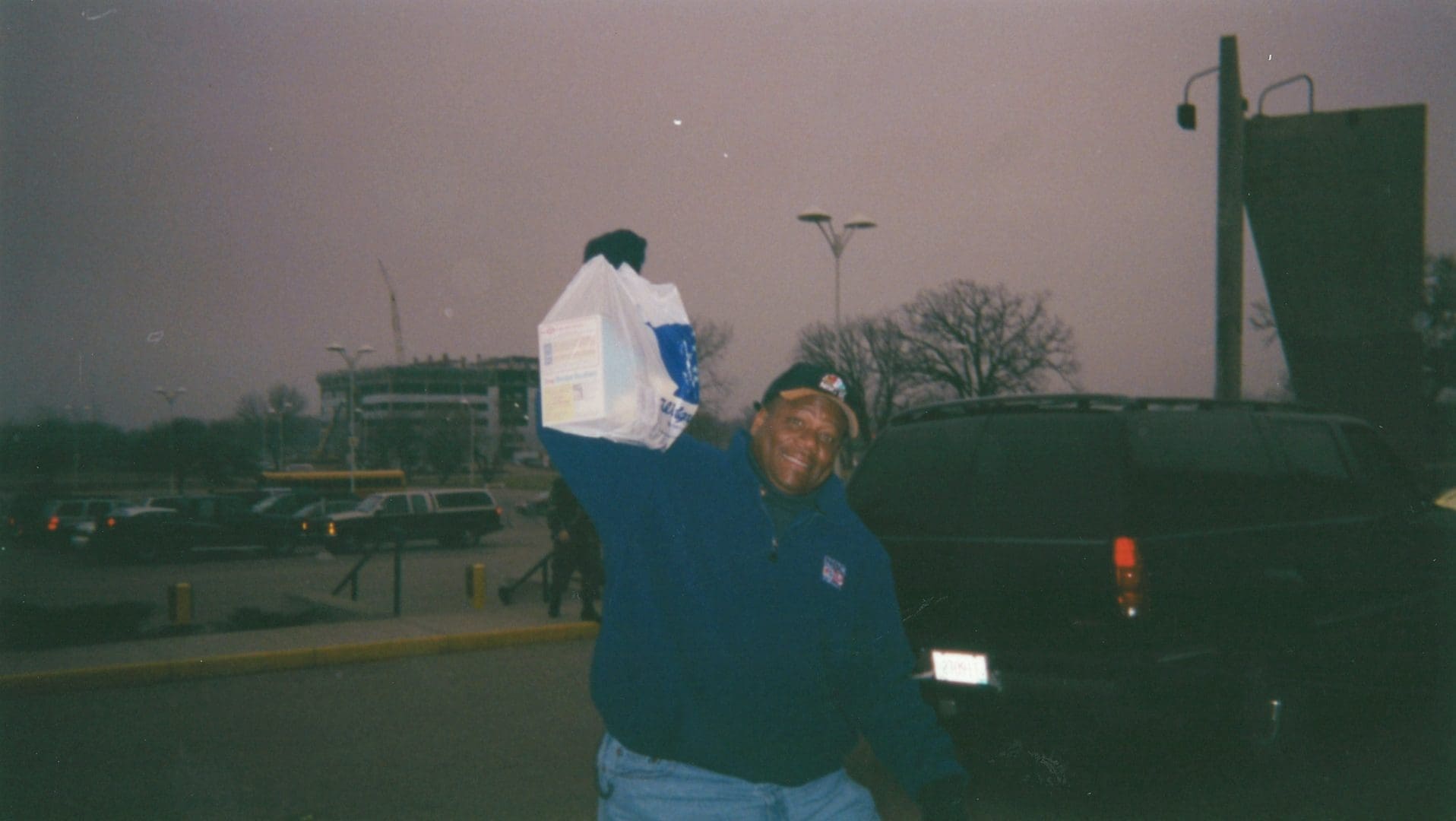 Nbc 15 anchor and wmtv share your holidays creator mike mckinney holding a bag of groceries