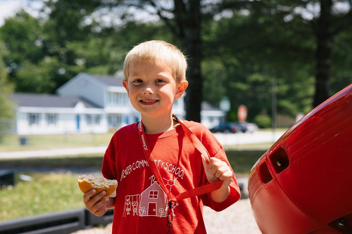 Boy eating sandwich