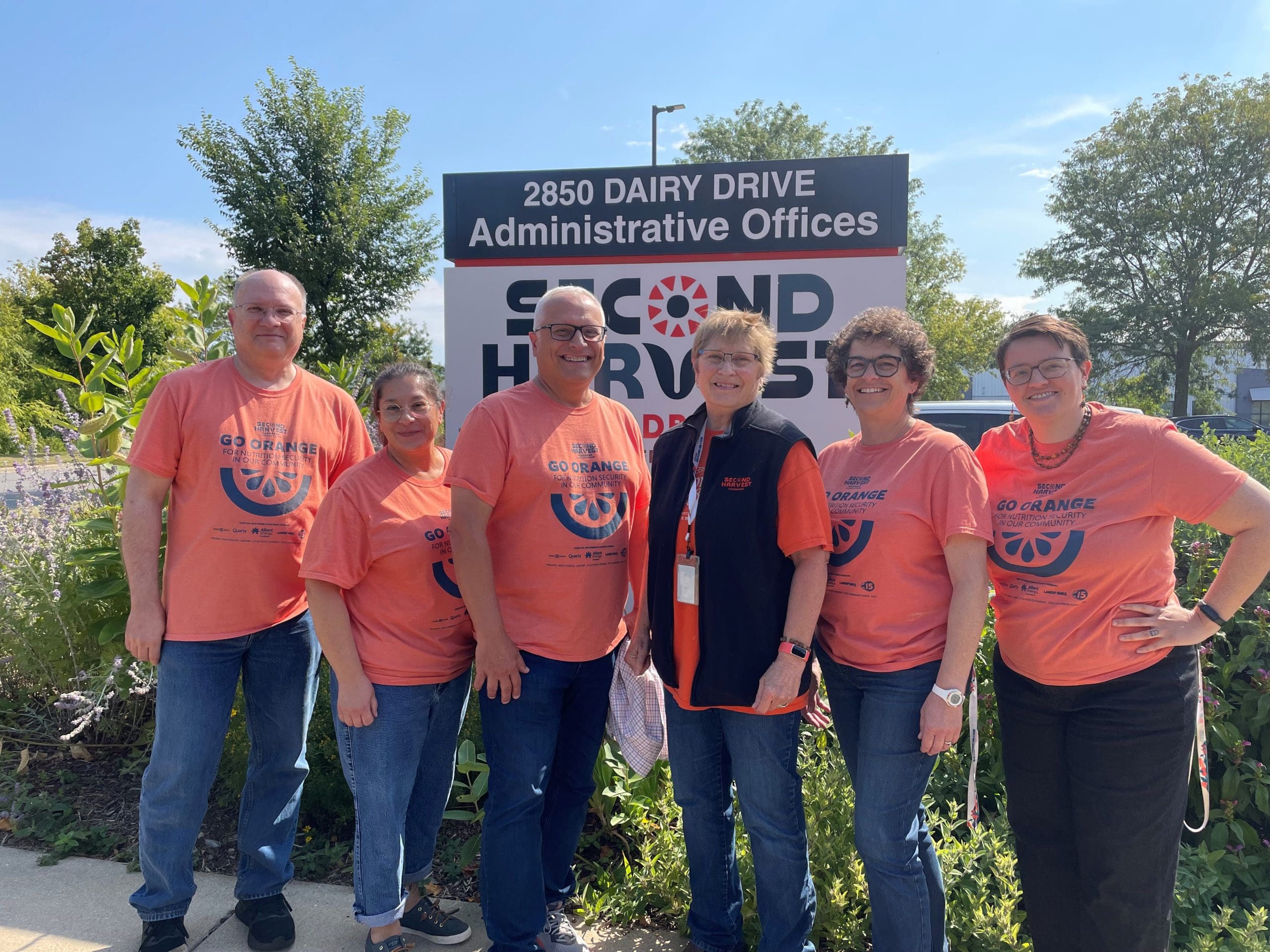Development team wearing their Go Orange t-shirts