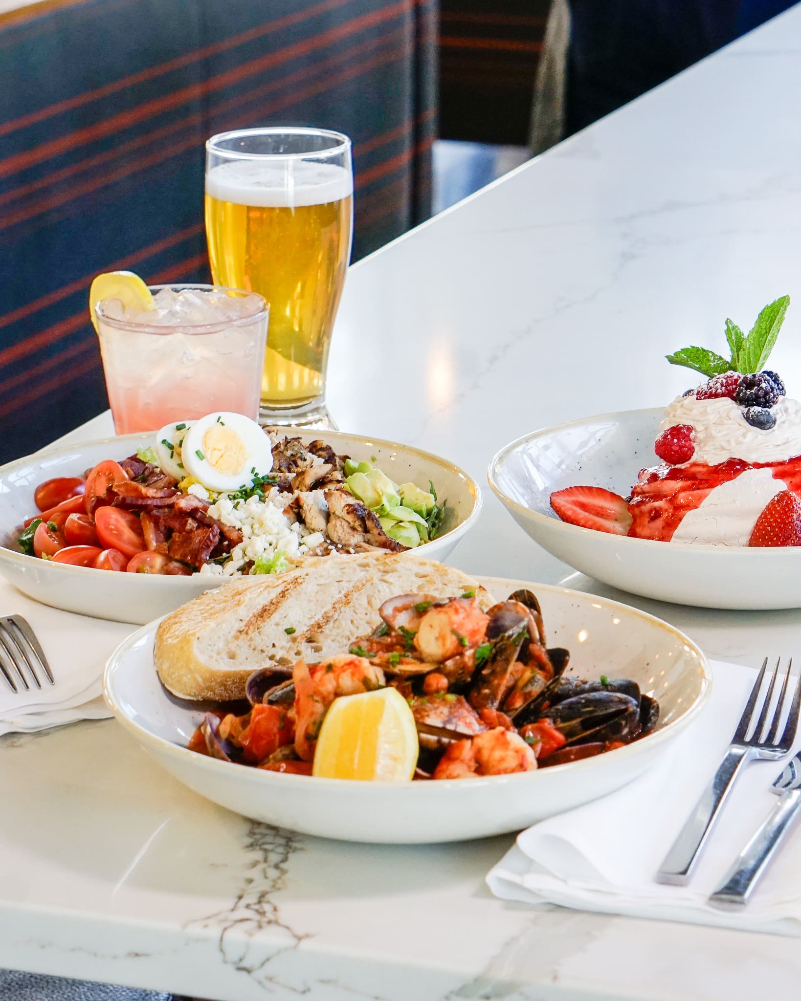 Cobb salad and drinks.