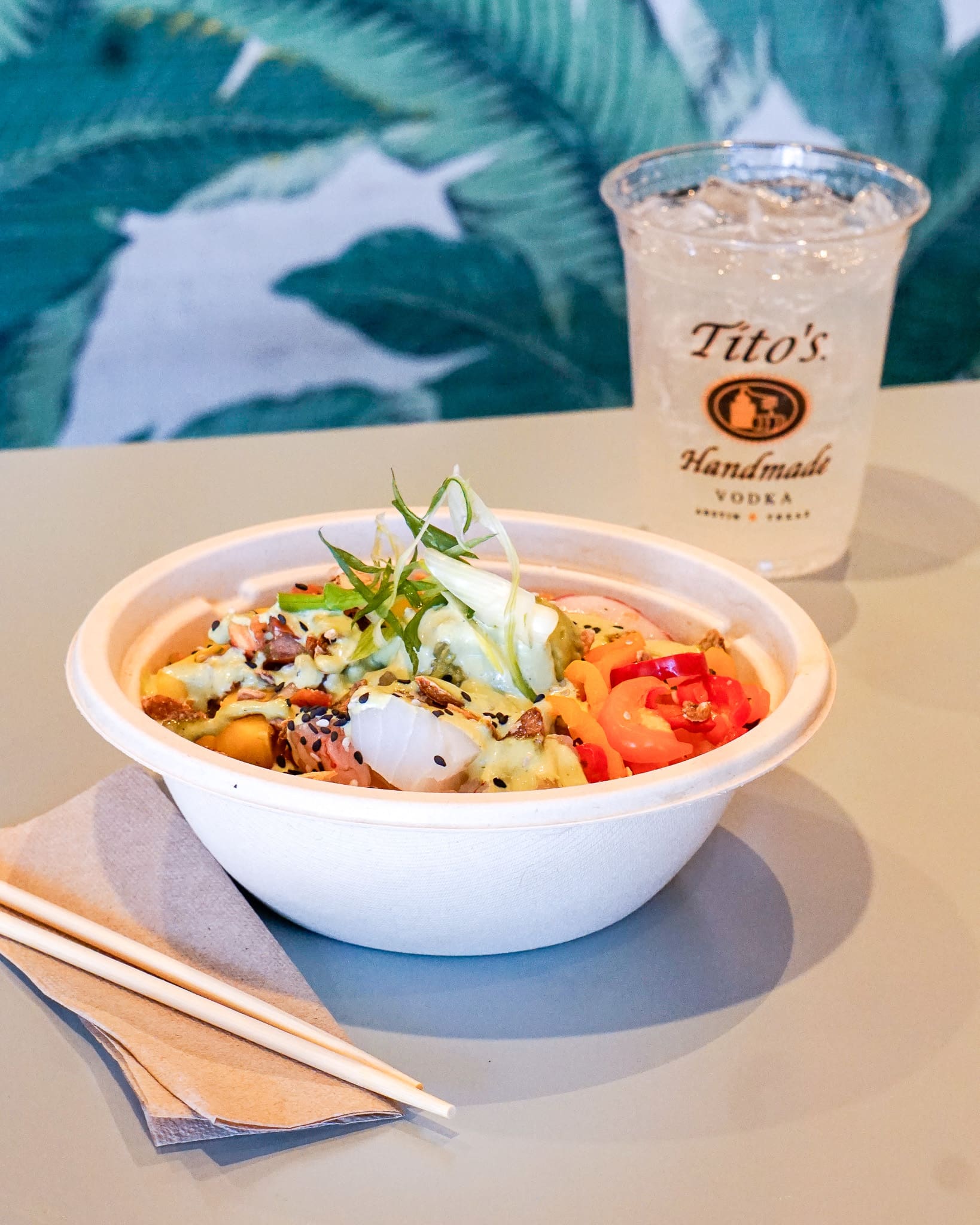 Poke bowl with mixed drink.